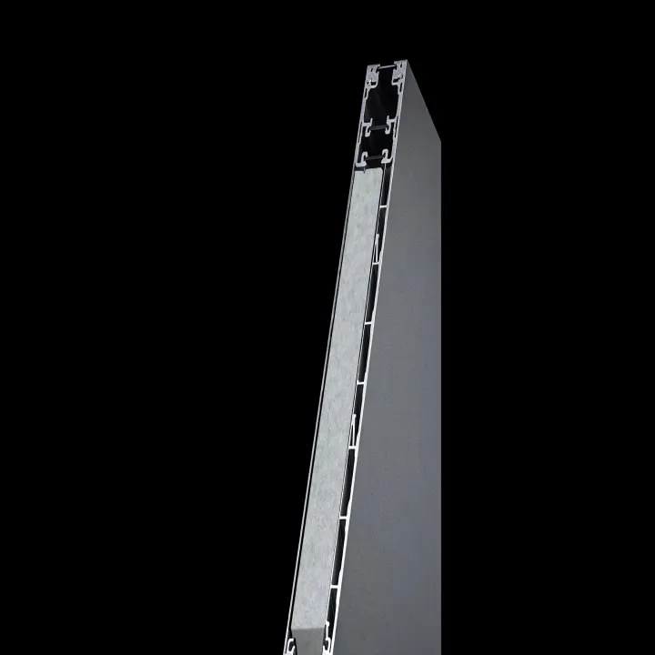 The edge of a black aluminium door slab, showing its profile, against a black background