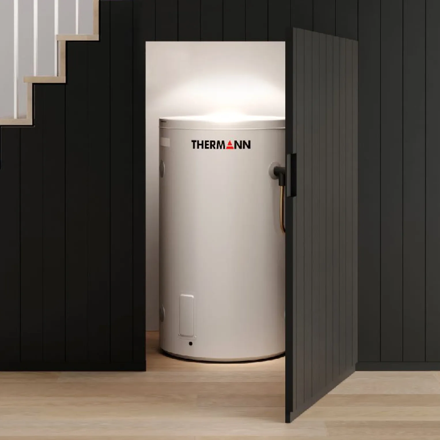 A white Thermann hot water tank glowing under a light in a cupboard beneath a staircase