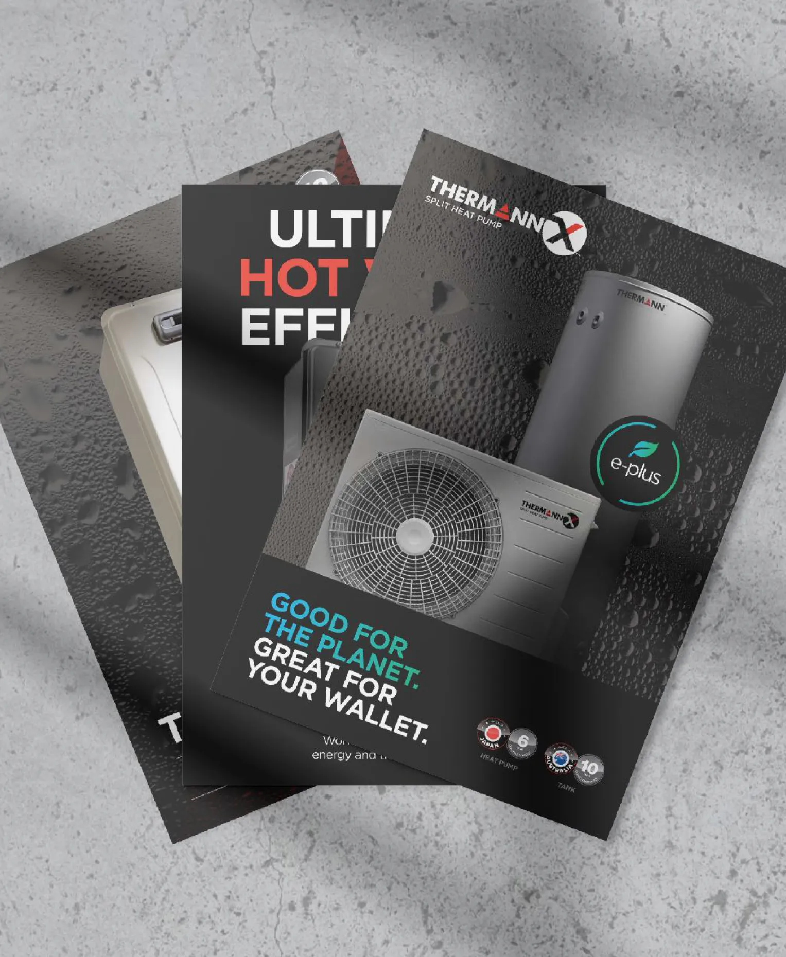 Fanned Thermann brochures on grey concrete, the front one for the Thermann X split heat pump with the line “Good for the planet. Great for your wallet.”